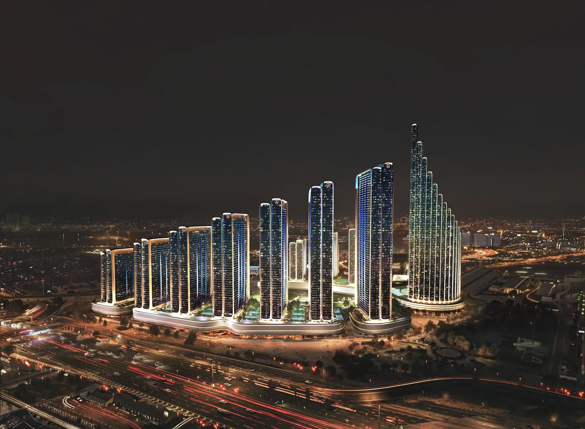 Mercedes-Benz Places by Binghatti illuminated at night - book a site visit in Downtown Dubai